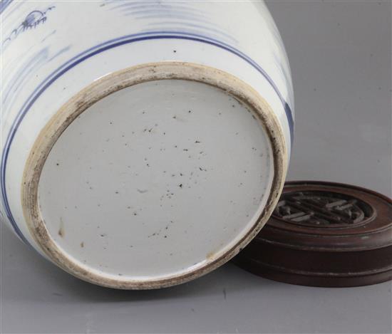 A Chinese blue and white ovoid jar, 18th century, total height 23.5cm including pierced wood cover